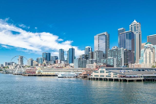 The shoreline of San Diego rises above the water with mid- and high-rises.