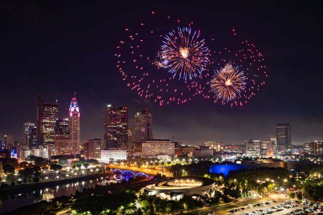 Fireworks over the skyline of Columbus, OH at night.