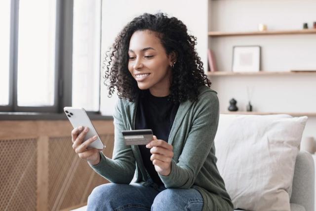 A renter making a payment using her cell phone.