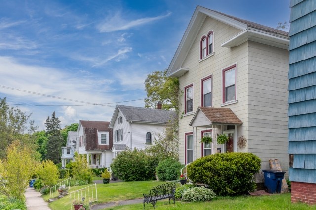 Charming homes line a residential street in New Haven, Connecticut.