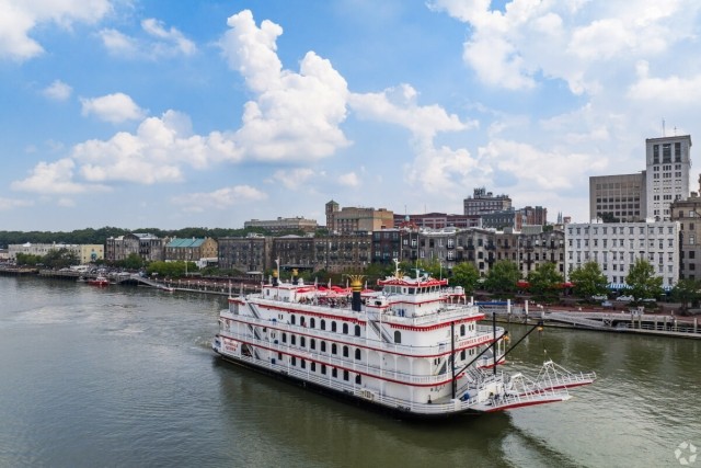 Boat running along the Savannah River in Downtown Savannah.