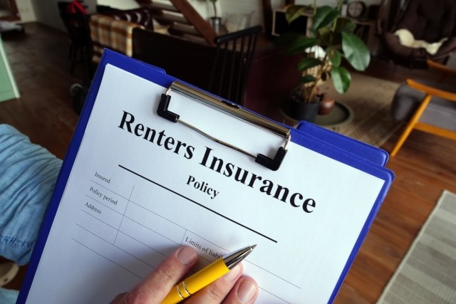 Tenant reviews renters insurance policy.