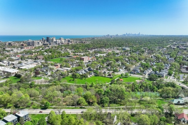 Evanston spreads out in neighborhoods and green spaces with Chicago in the distance.