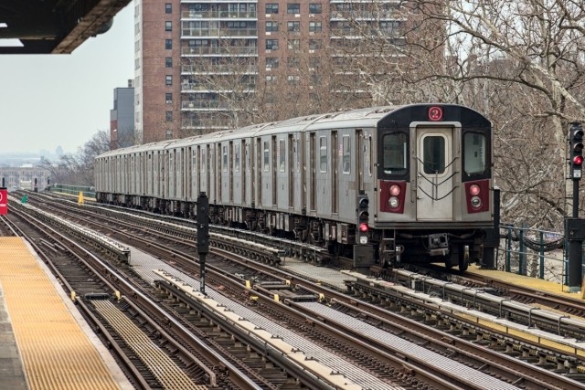 A subway train passing through the Bronx neighborhood