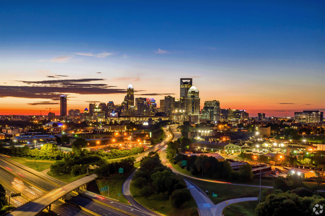 Third Ward in Charlotte, NC, at nighttime.