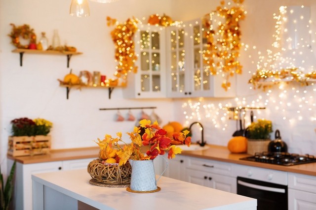 Photo of an apartment kitchen with fall apartment decor.