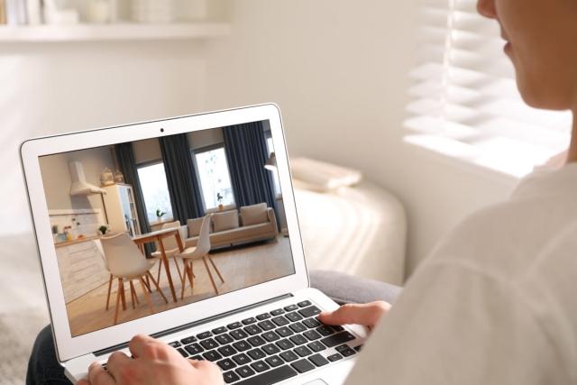 Renter views a 3D apartment tour online.