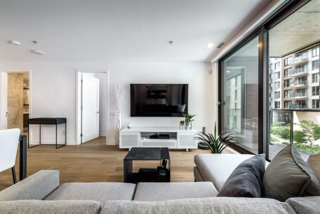 A furnished apartment with furniture and a television