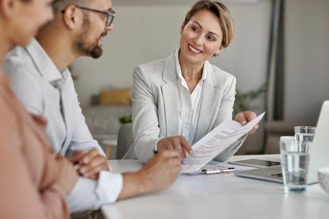 Landlord meeting with tenants to sign an agreement