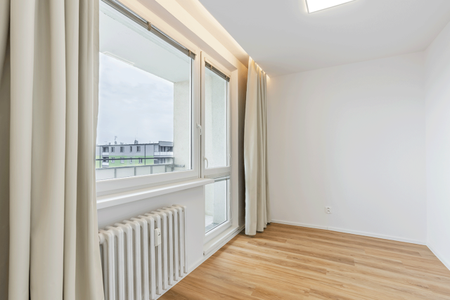 Vacant White Apartment Bedroom