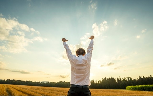Happy man in a field