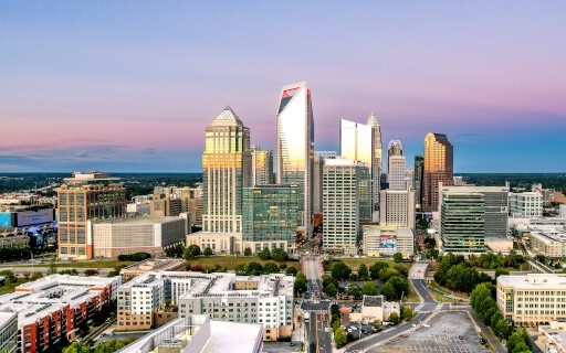 Evening drone shot of the Charlotte, NC skyline.