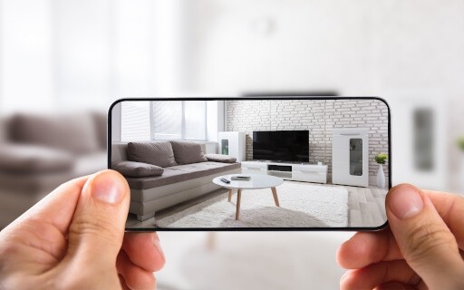 Person recording a 3D tour on their phone.
