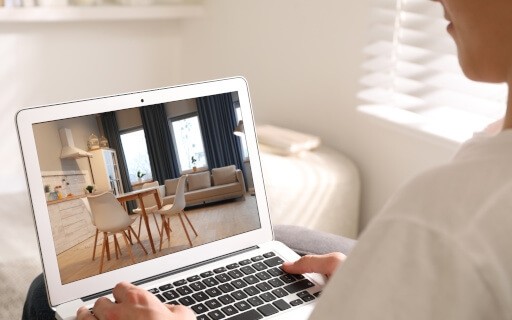 Renter views a 3D tour online. 