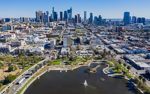 Downtown Los Angeles rises up in the back of greater Los Angeles metro areas.